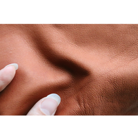 Luffer i brunt lammeskind