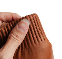 Luffer i brunt skind med elastik bånd