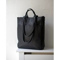Stor computertaske dame sort skind arbejdstaske i bæredygtigt læder 